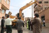 آزادسازی املاک توافق شده خیابان القلندیس با حضور فرماندار